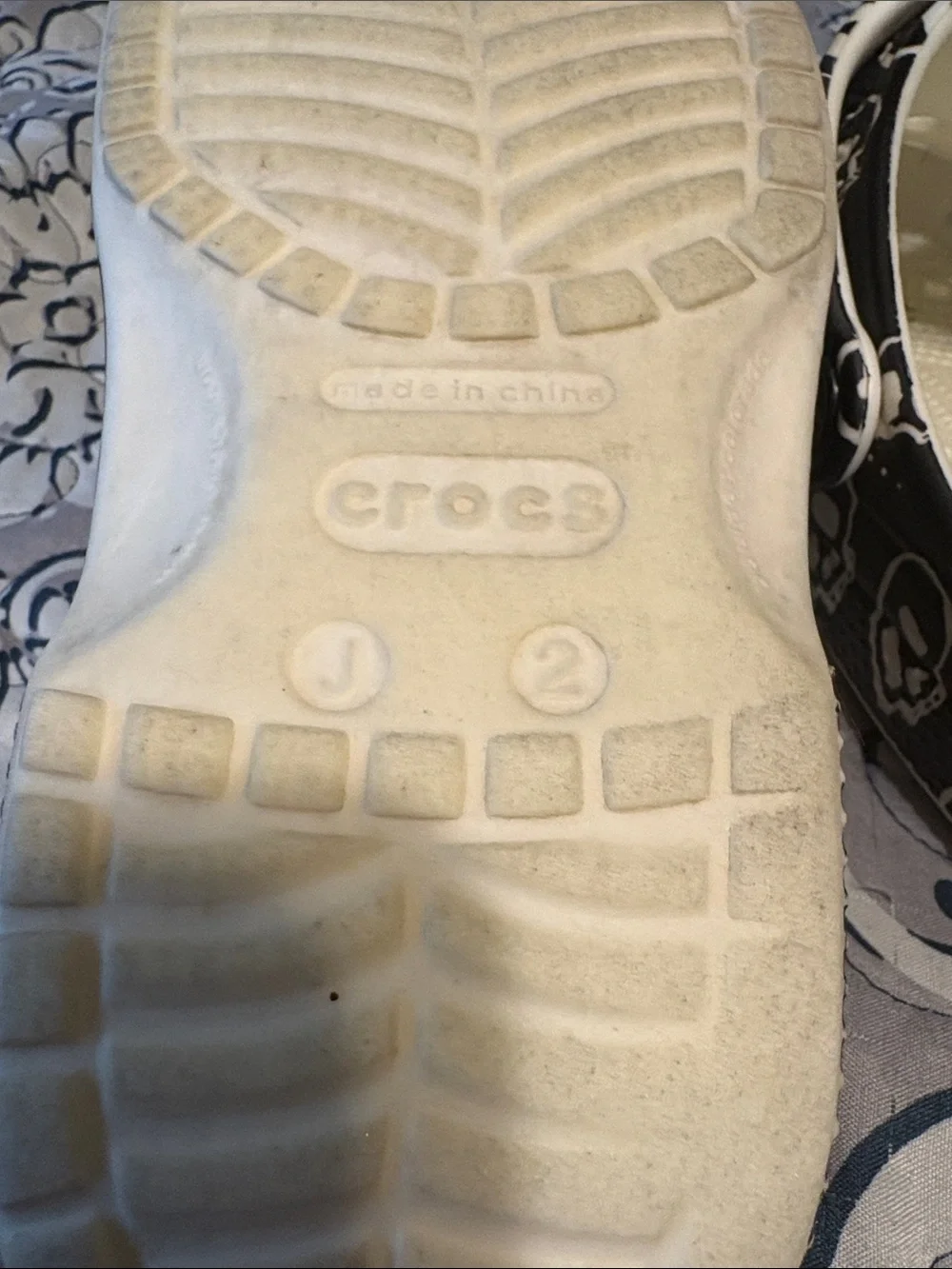 Crocs junior size 2, go in the dark shoes